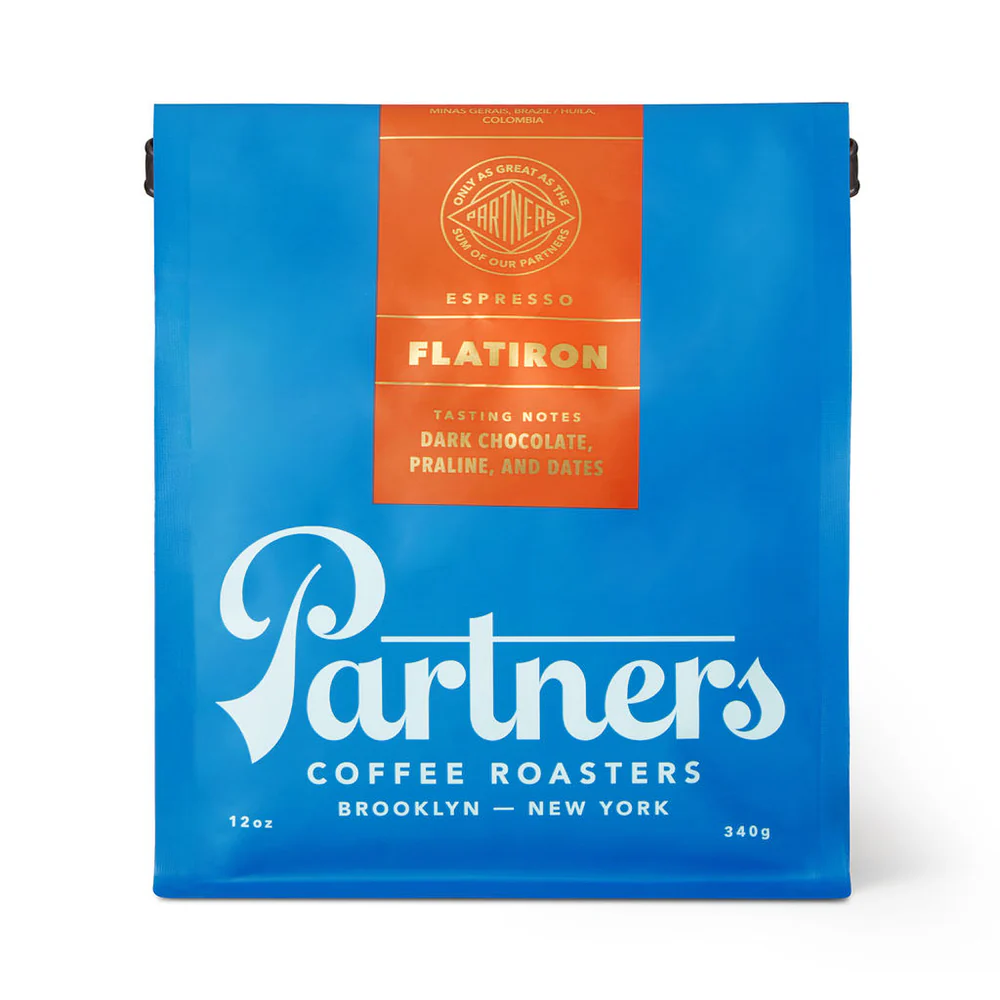 a blue bag of partners coffee on a white background