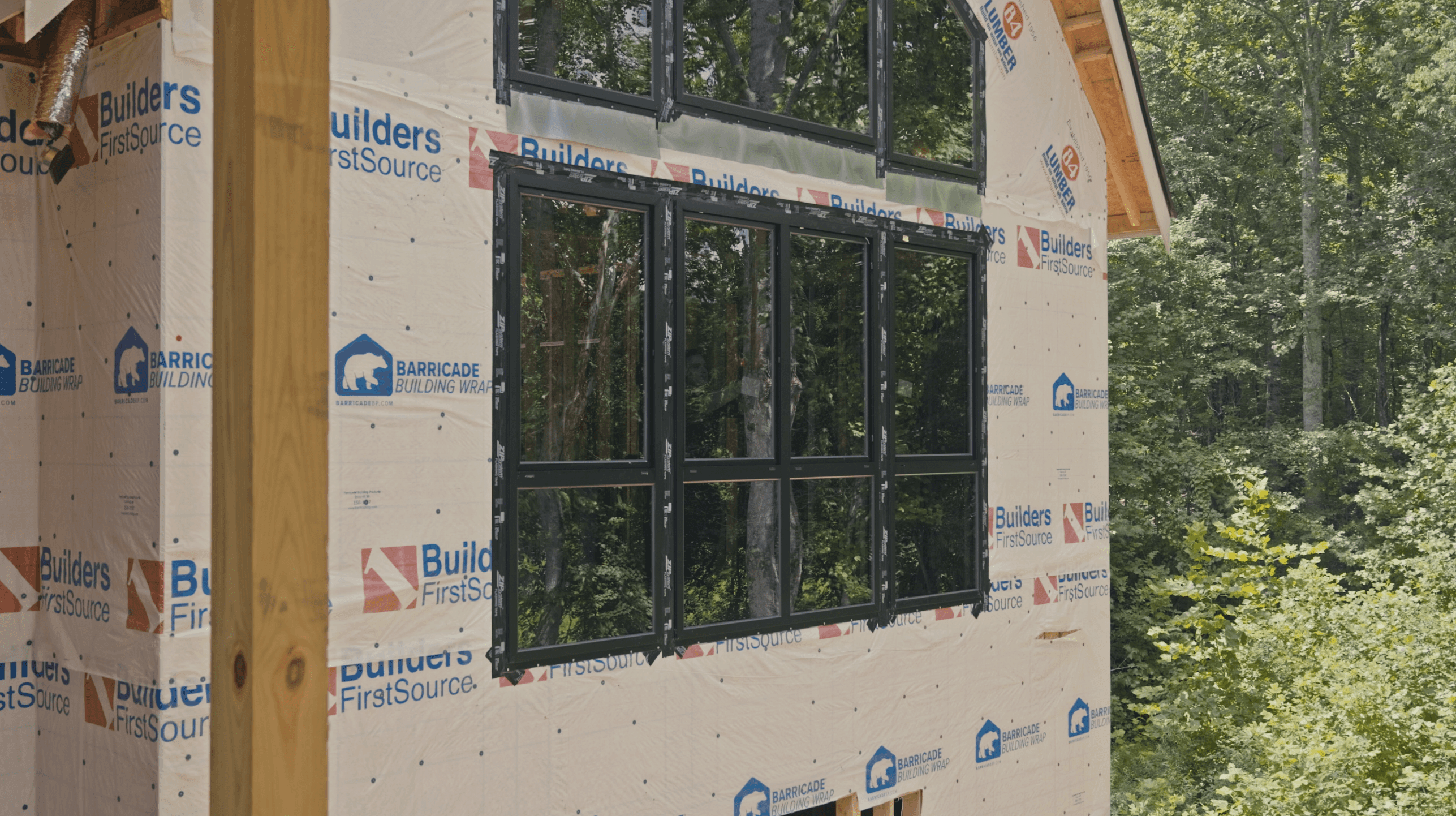 Installed black window unit on the wrapped exterior wall