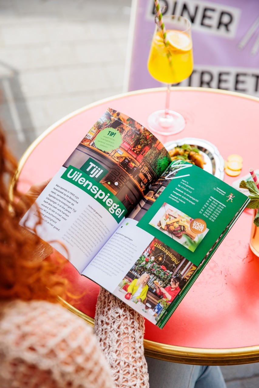 woman scrolling through content on her iphone