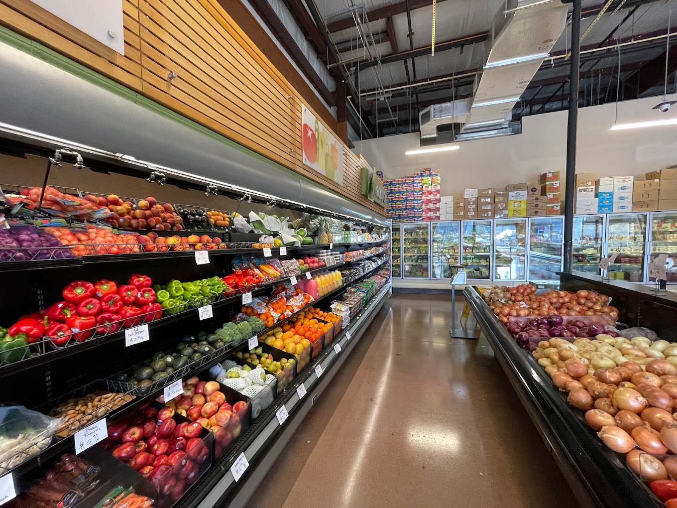 Fresh produce section with a variety of fruits and vegetables at International Food Market Orlando, located on Goldenrod Road, offering high-quality, fresh ingredients for the local community.