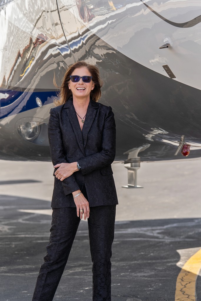 person sitting in a chair in front of a man