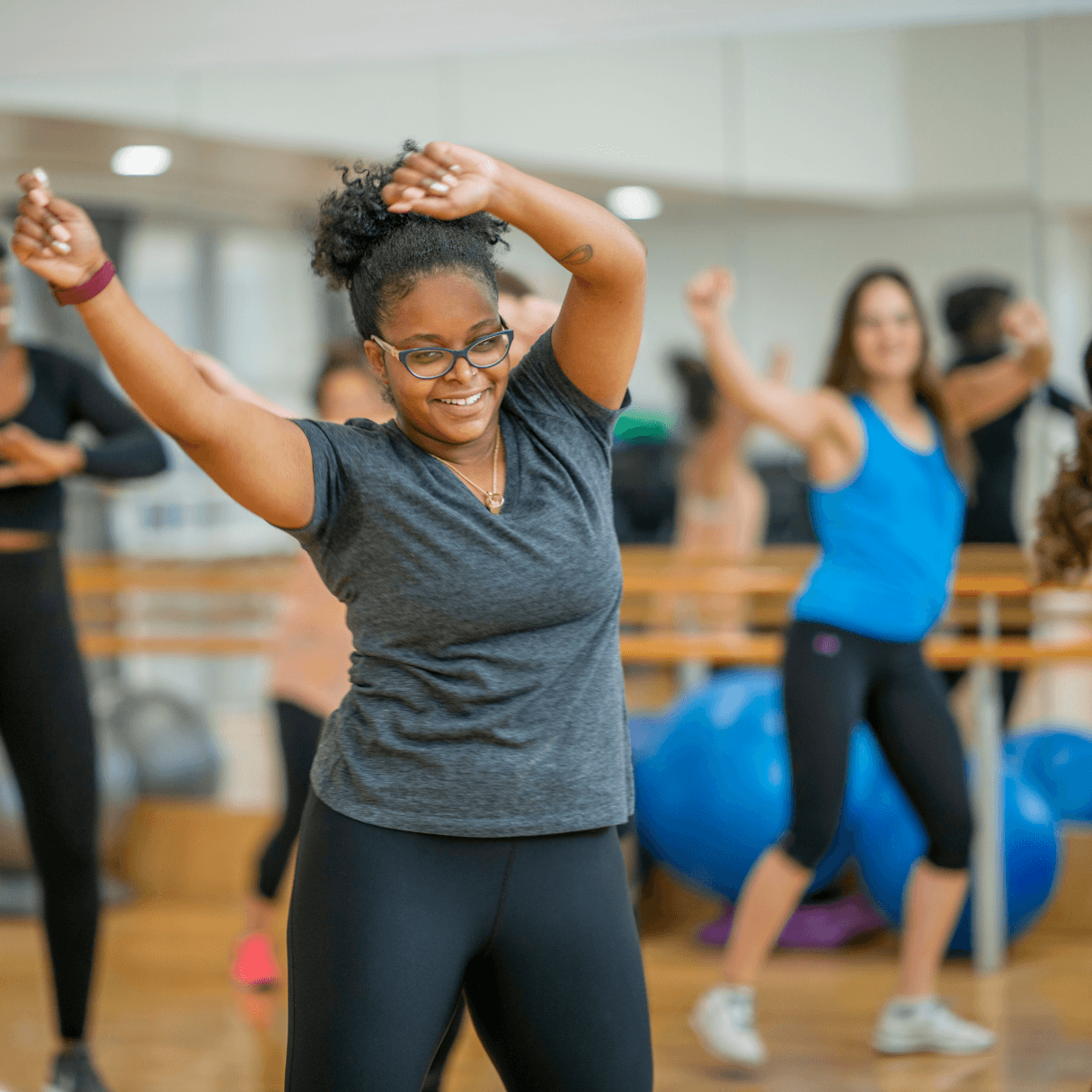A woman enjoying a dance class