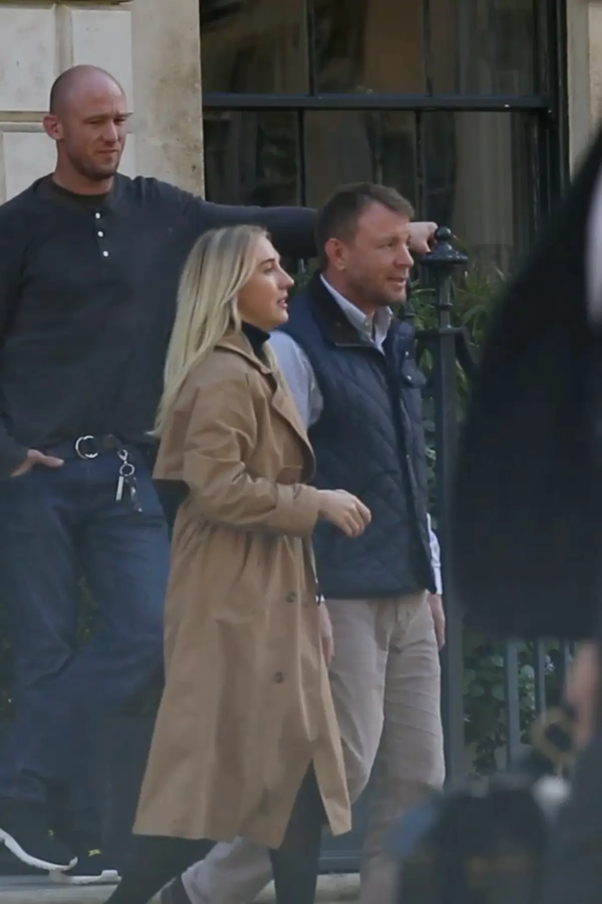 Elena and Guy Ritchie standing outside his London apartment during the documentary