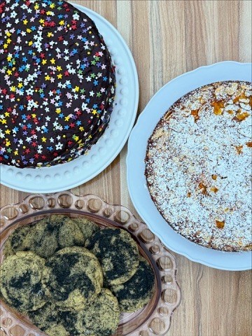 Chocolate cake with sprinkles, earl grey black sesame cookies, and orange almond cake