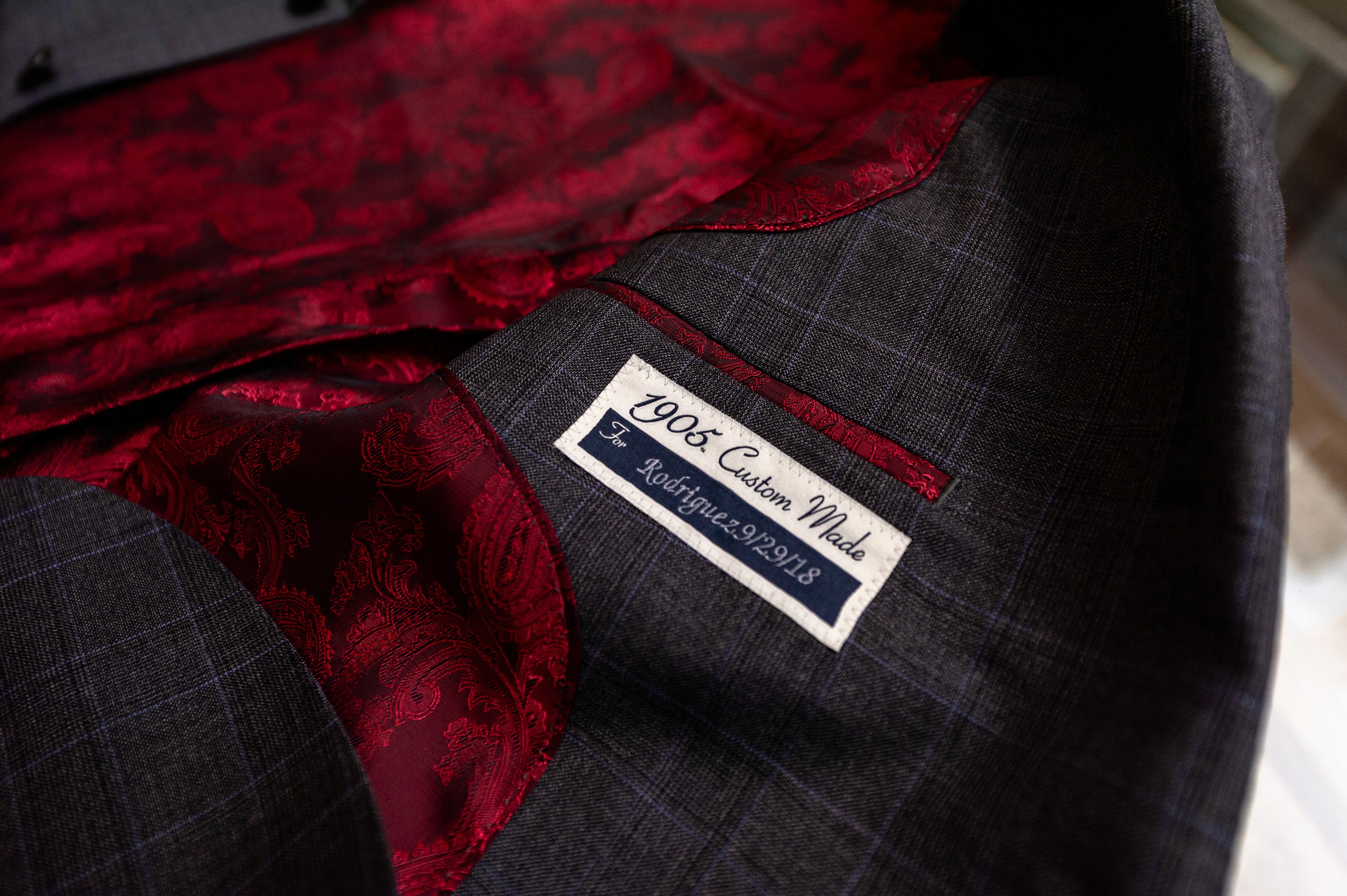 Flat lay wedding details with bouquet, rings, and sparkling bridal heels