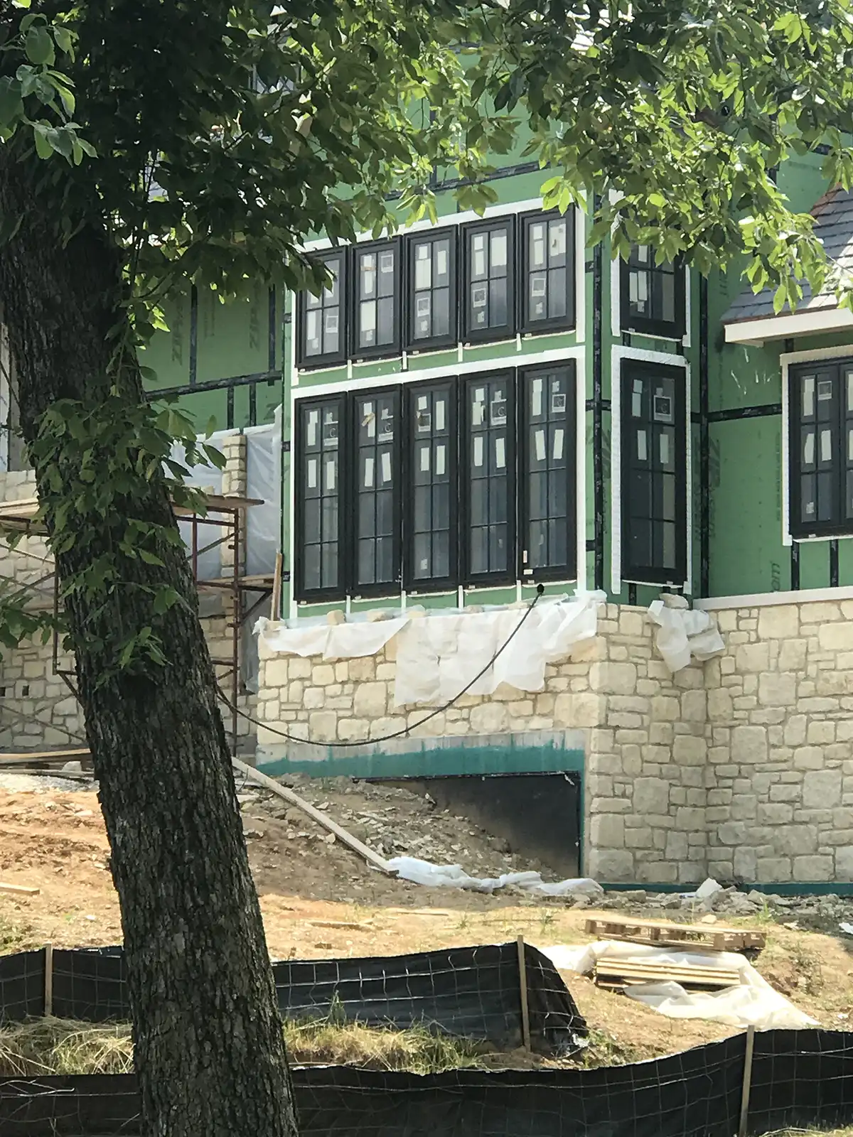 Photo of a golf course clubhouse with the foundation coated in Rub-R-Wall waterproofing coating to prevent water from damaging the foundation.