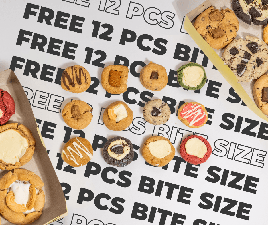 three people sitting in front of table laughing together