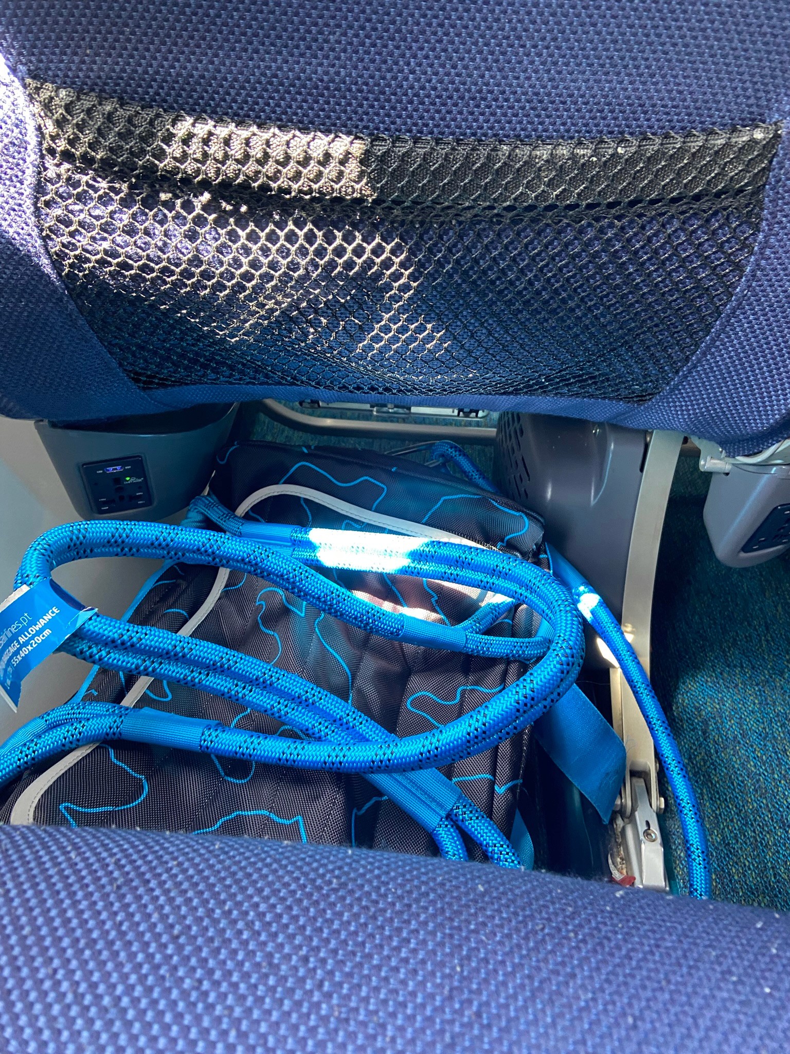 Dog in carrier under a window seat on SATA airlines does not fit.