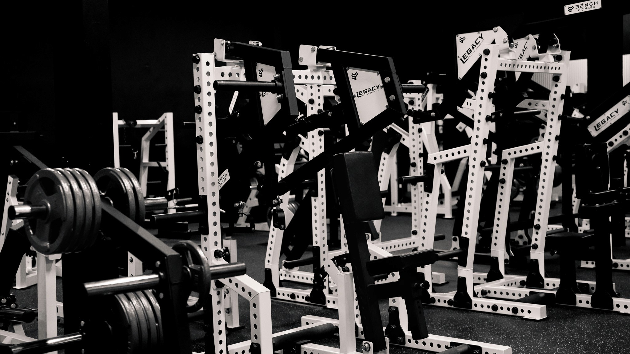 State-of-the-art gym at Legacy Muscle Universe Koh Samui with advanced strength and cardio equipment in a spacious, air-conditioned fitness facility.