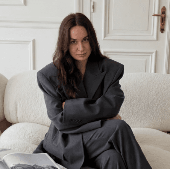 A surreal portrait of a person in motion, with light streaks and a blurred effect creating a dynamic and artistic vibe.