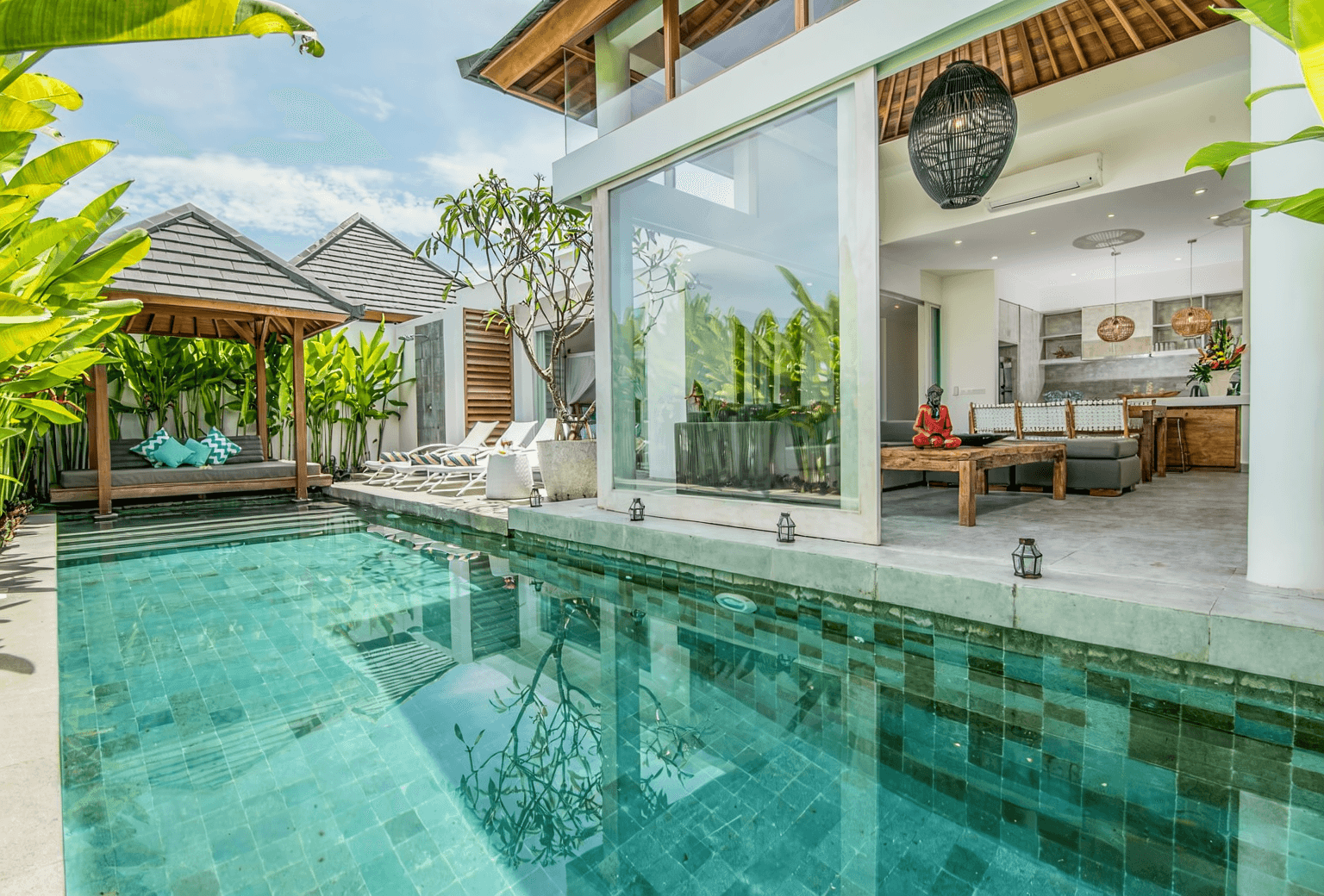 Stunning pool view and outdoor gazebo in Canggu. Our real estate agency helps you find the perfect Bali investment.