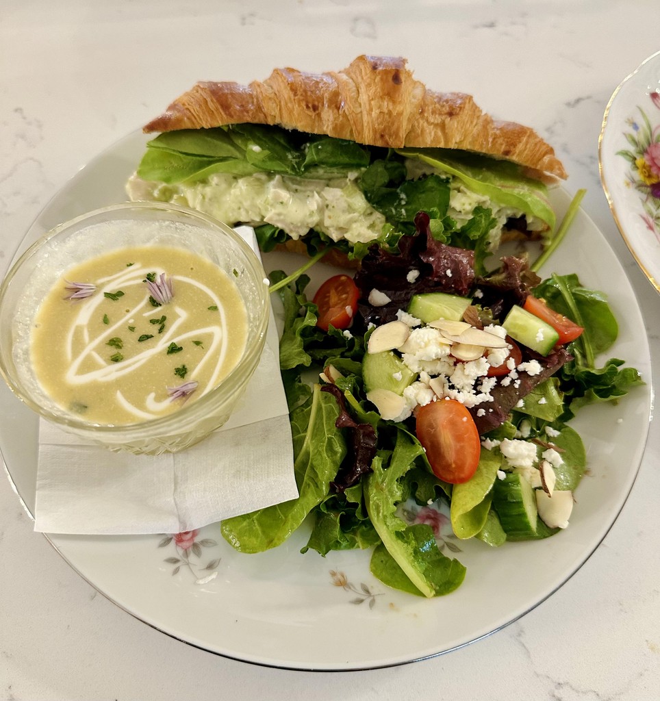 soup salad and a croissant sandwich