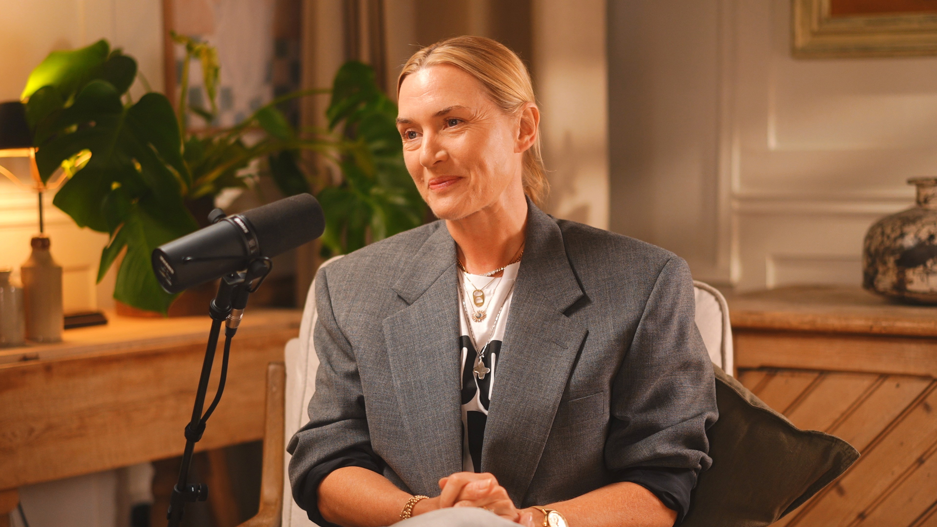 Contemporary interior with sculpted angled walls and a skylight filling the space with natural light.