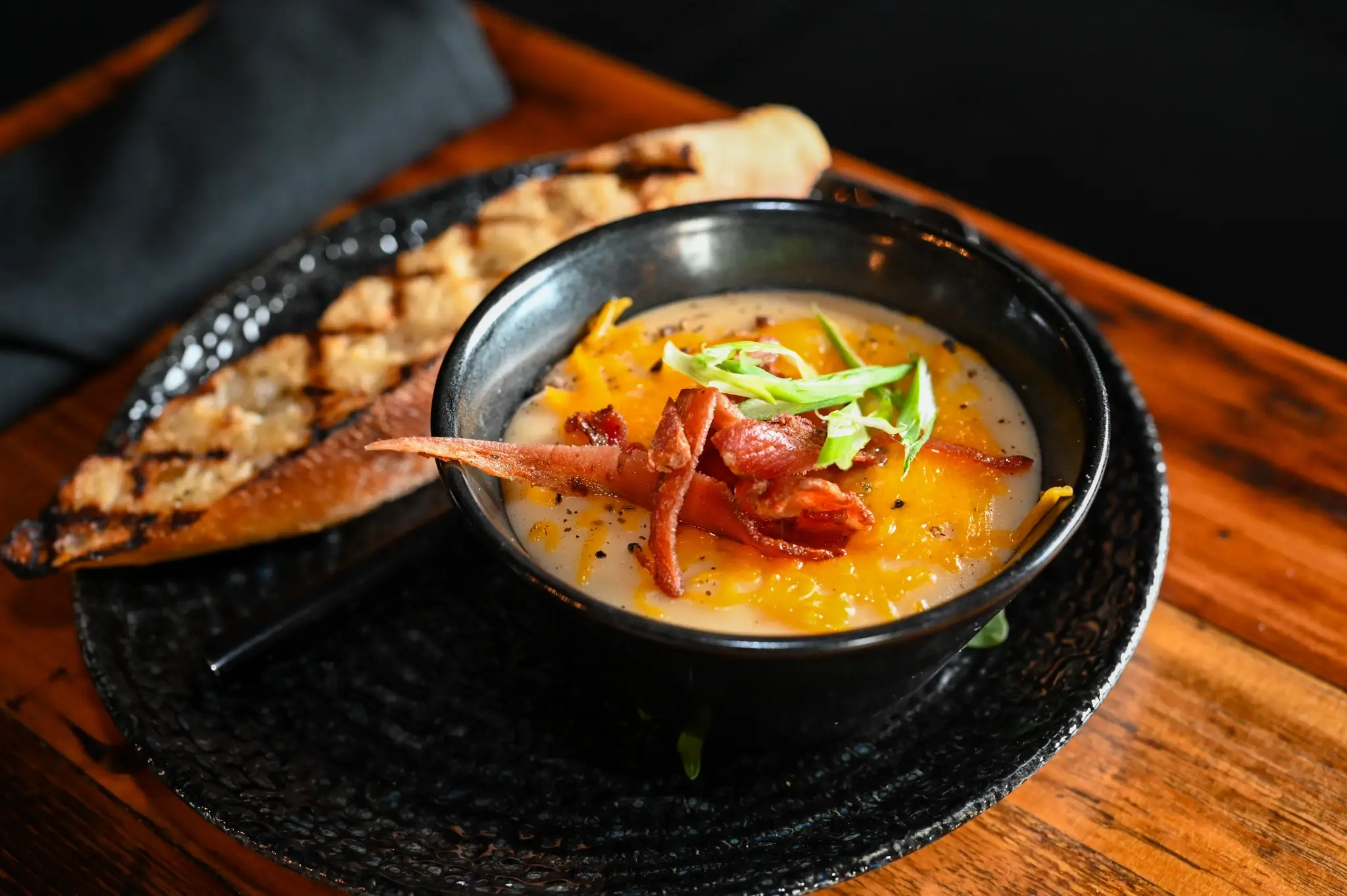 A bowl of soup and bread