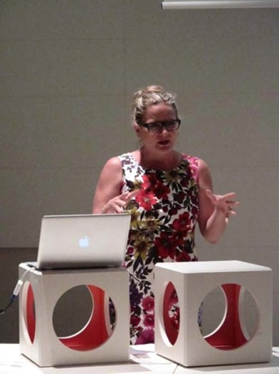 a woman in a flower patterned dress