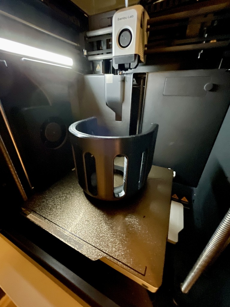 A 3D printer fabricating a prototype of a consumer product.