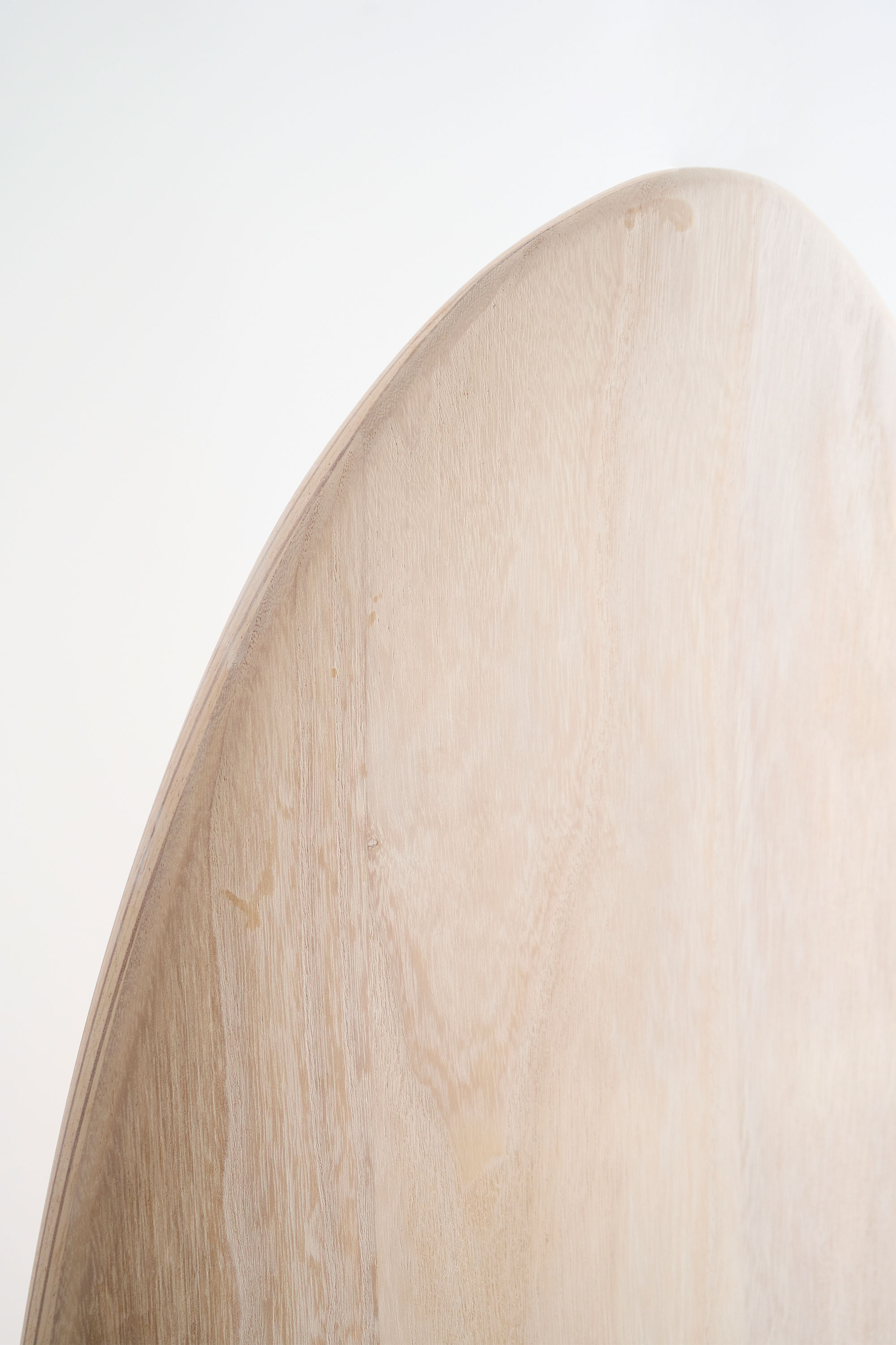 Round nose wooden surfboard