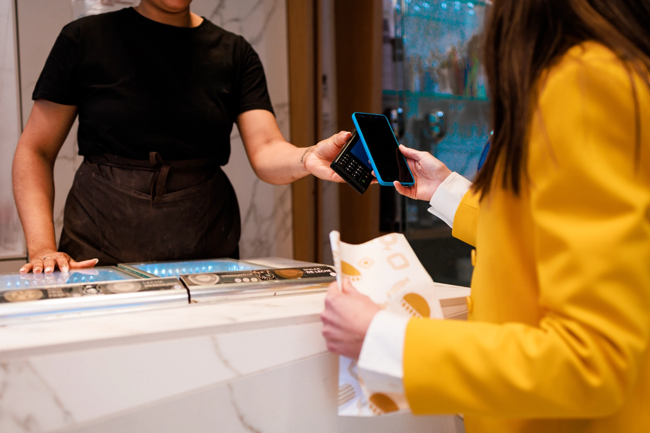 Host Accepting Payment at Front Desk