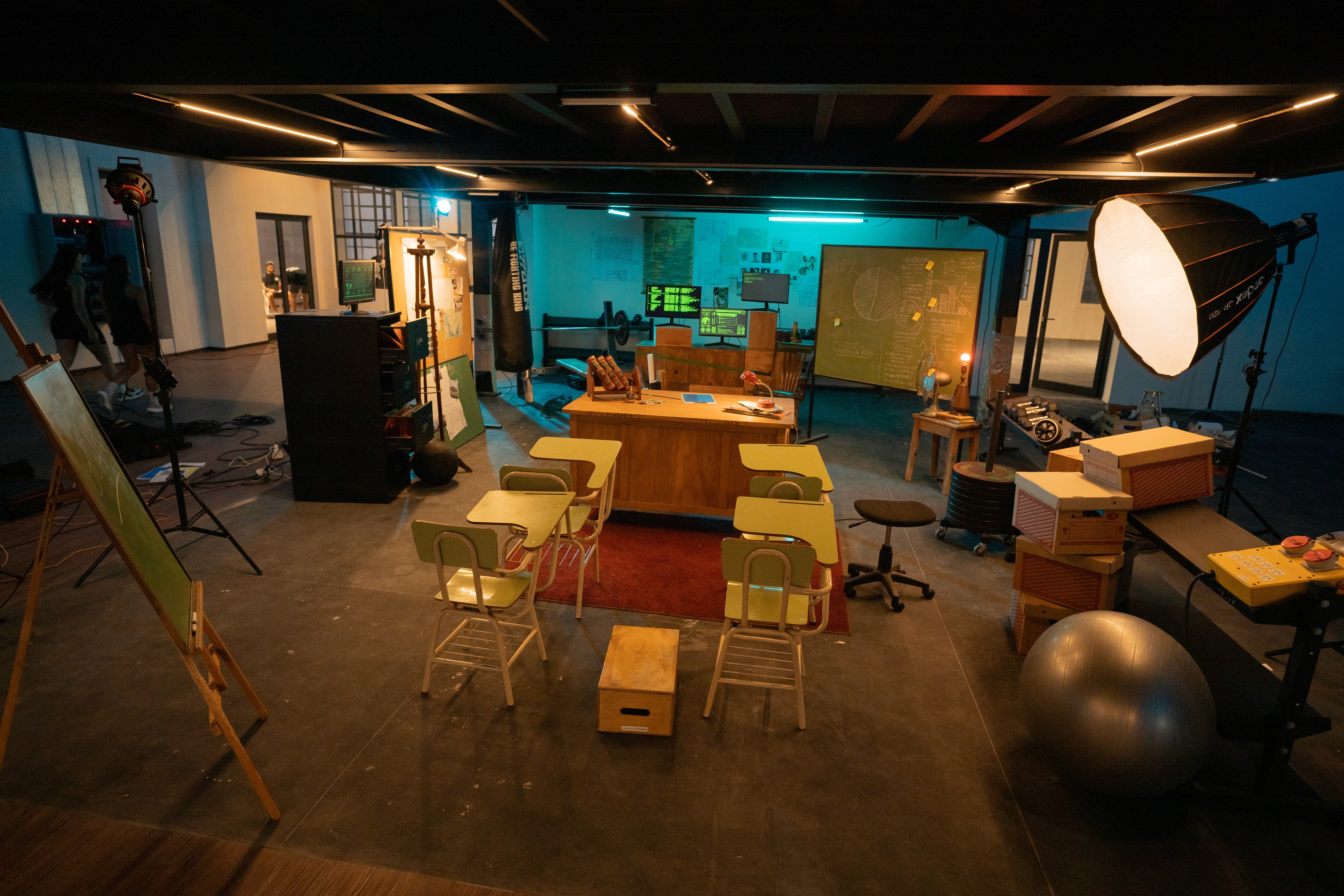 Person riding bicycle with wooden crate on front.