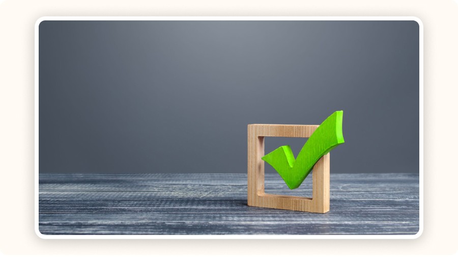 Green wooden checkmark