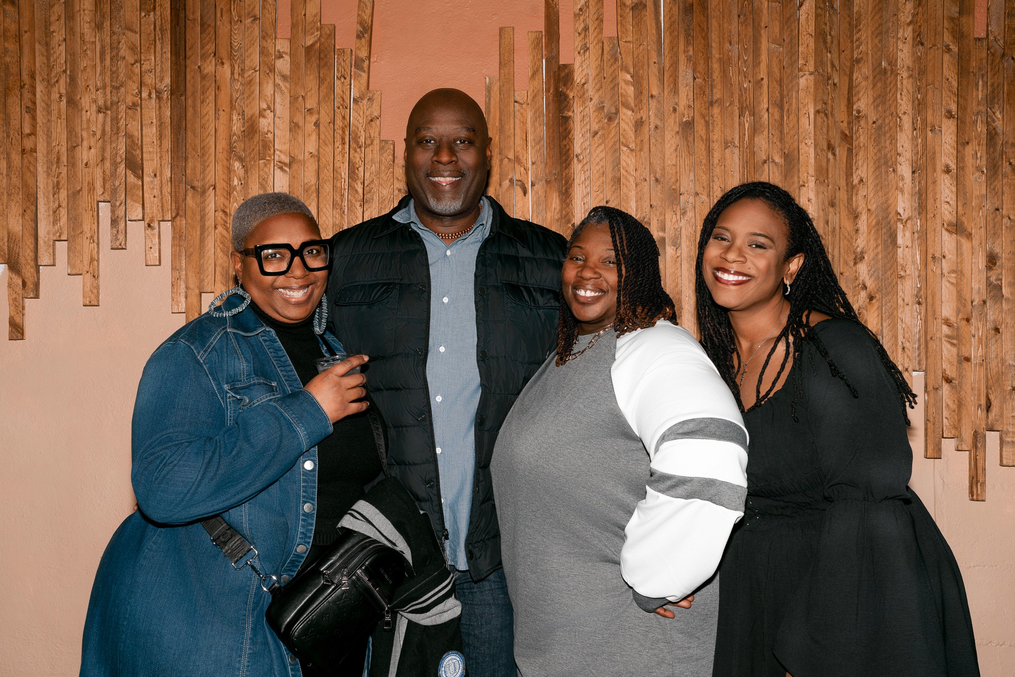 A Wonderful group of people at Turntable in Indianapolis smiling for posed picture