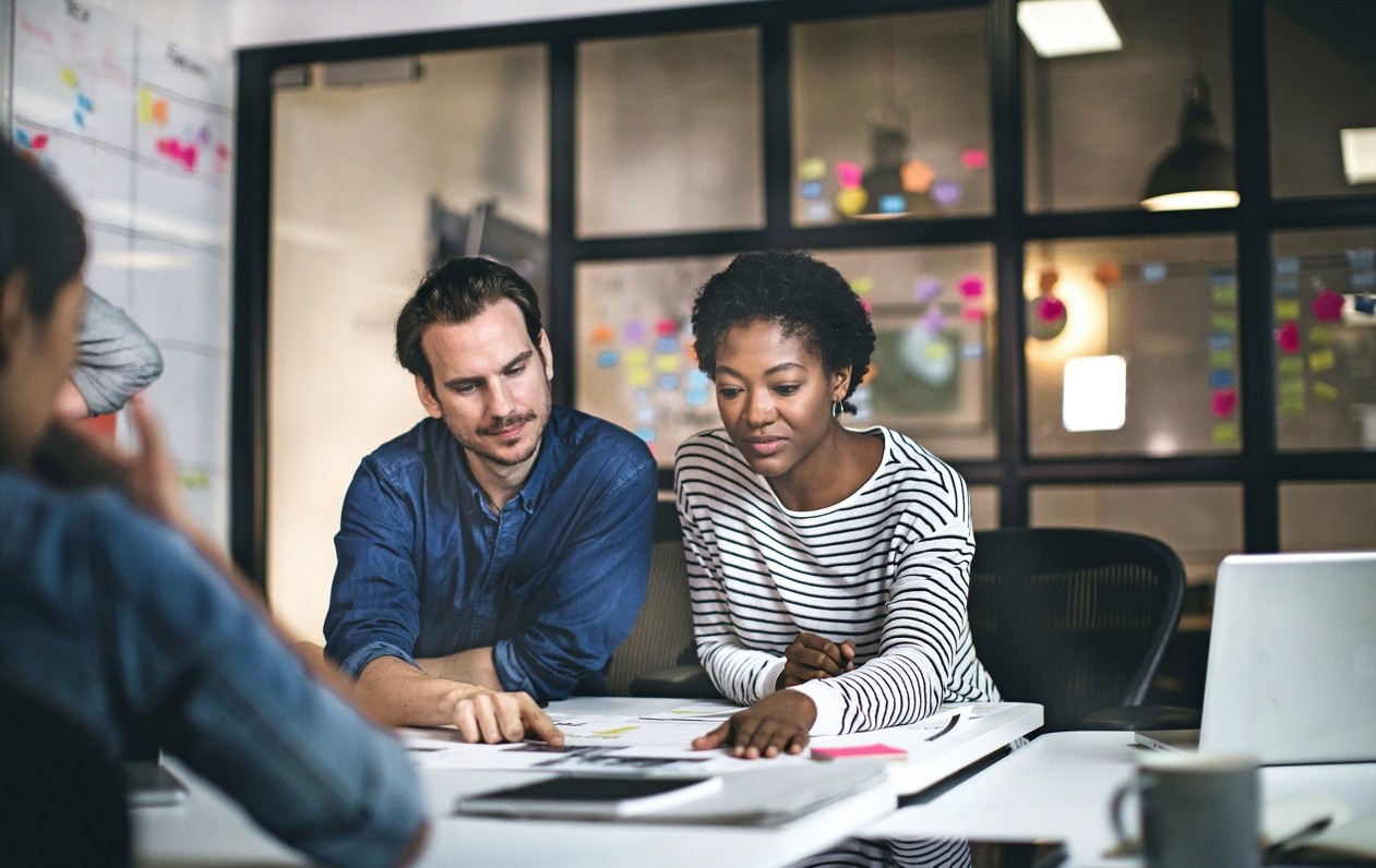 Family enjoying a moment outdoors with a baby