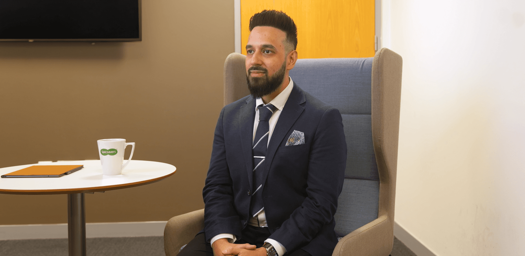 An screengrab of a video of an Optometrist being interviewed. 