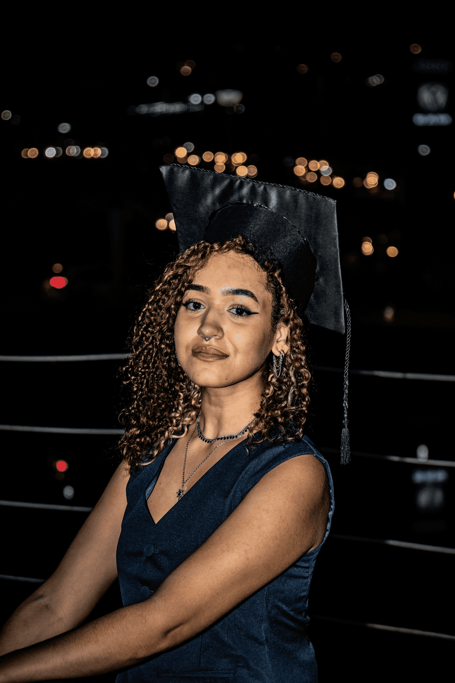 Flat lay of makeup essentials: brush, foundation, and powder on a beige background
