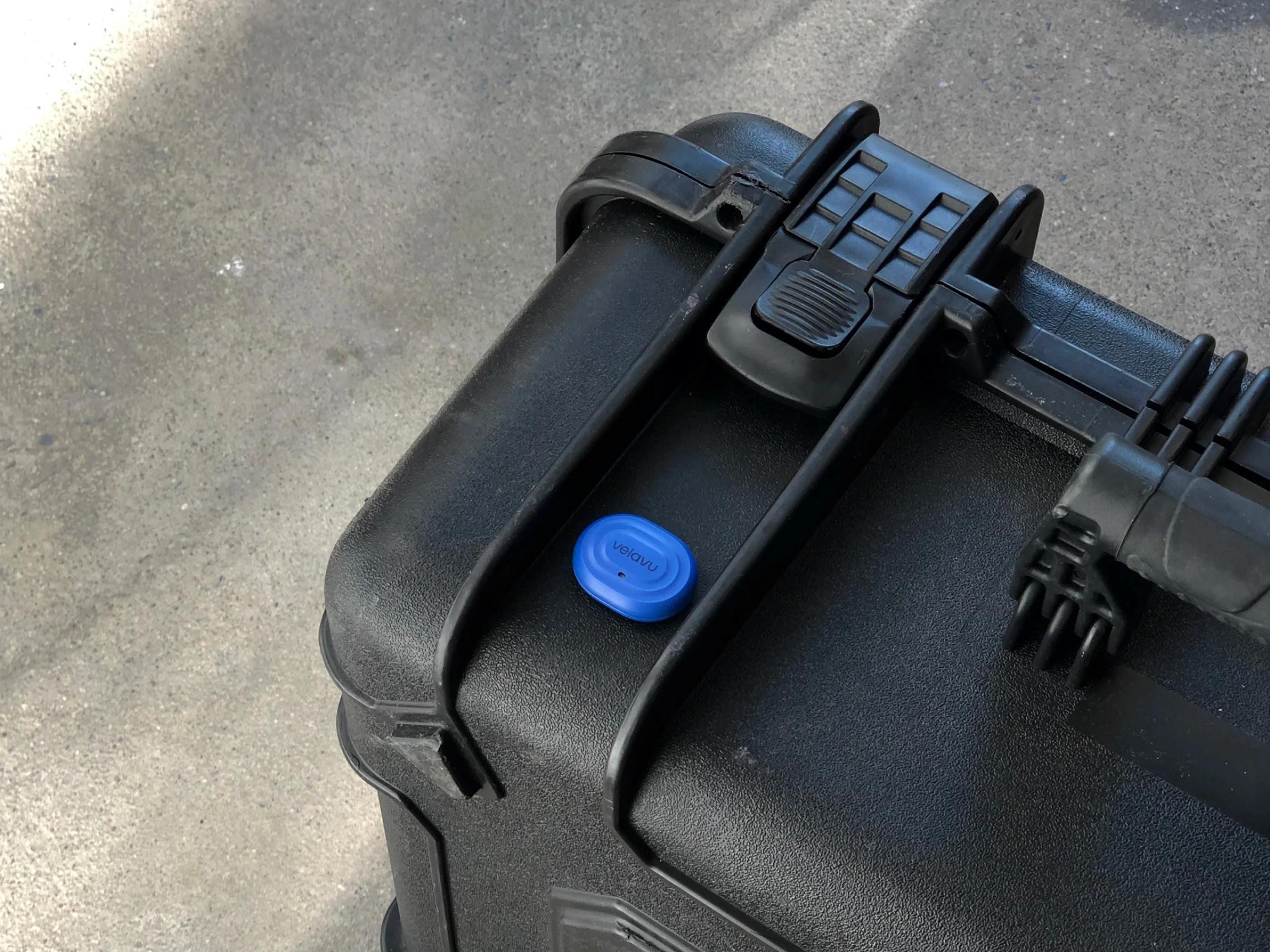 Velavu Arda tracking device attached to pelican case