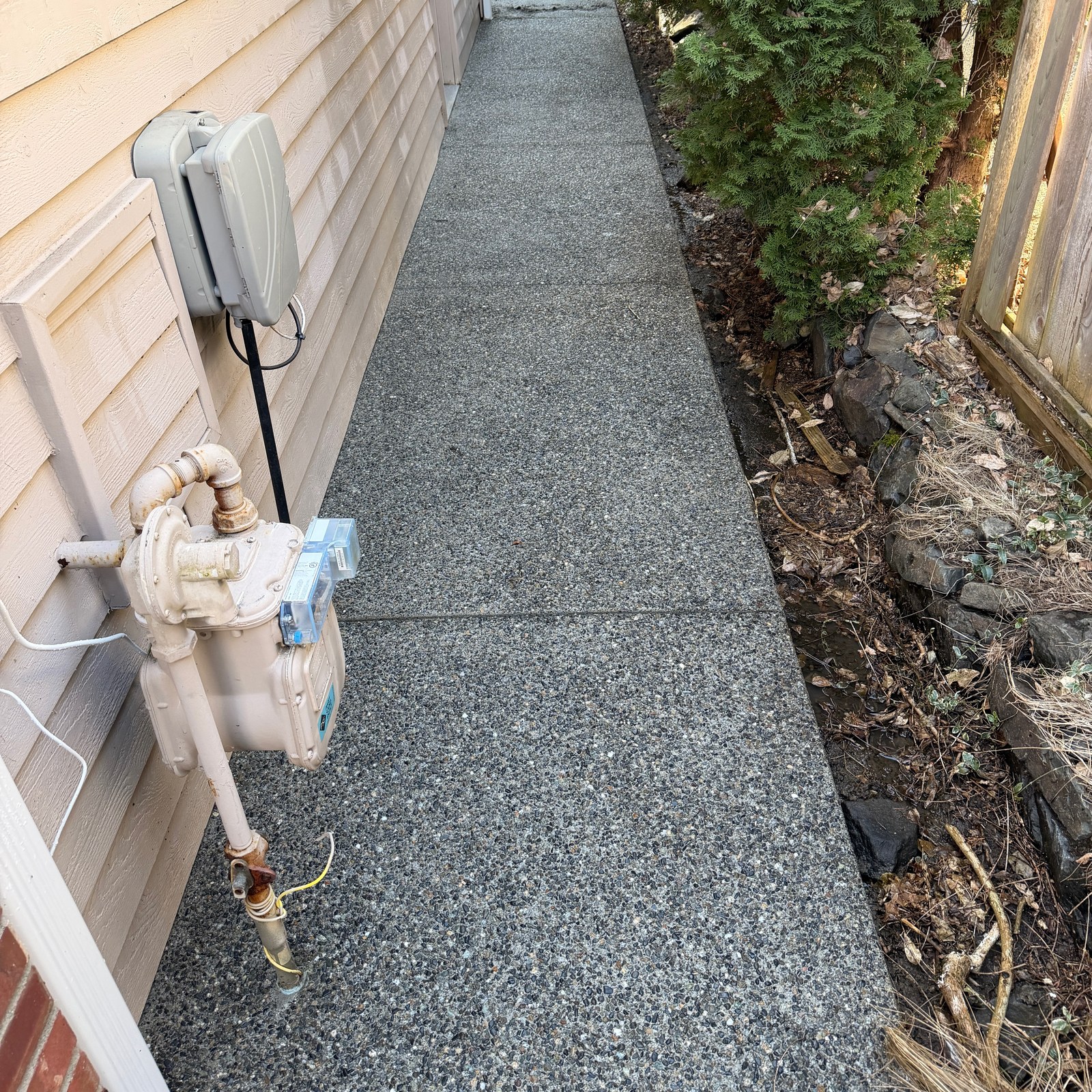 After: exposed aggregate side path pressure washing by Peterson Property Services in Washington