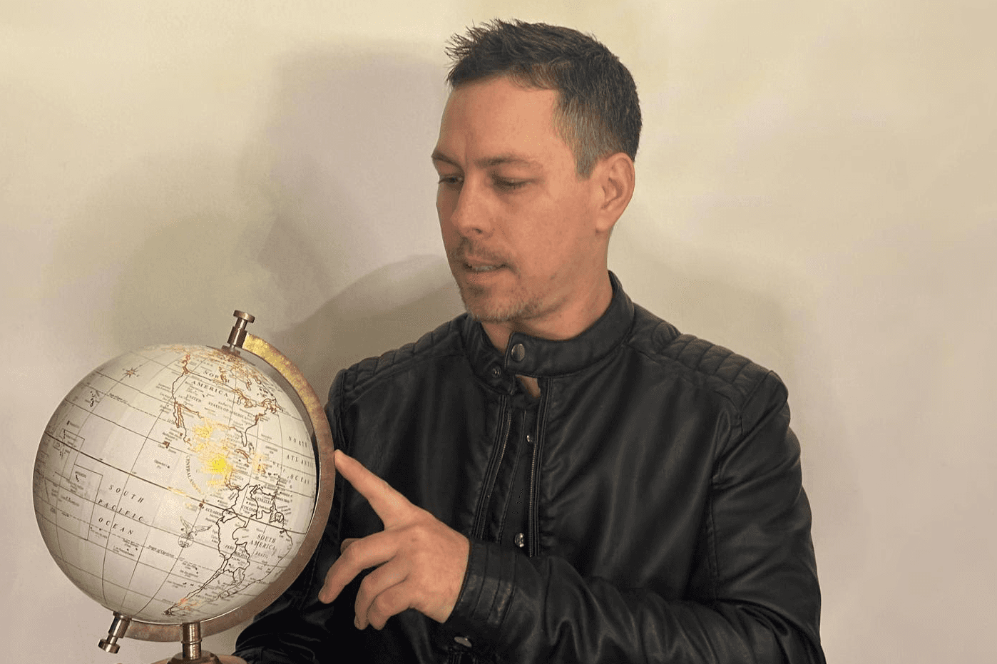 black car with half white and half black background