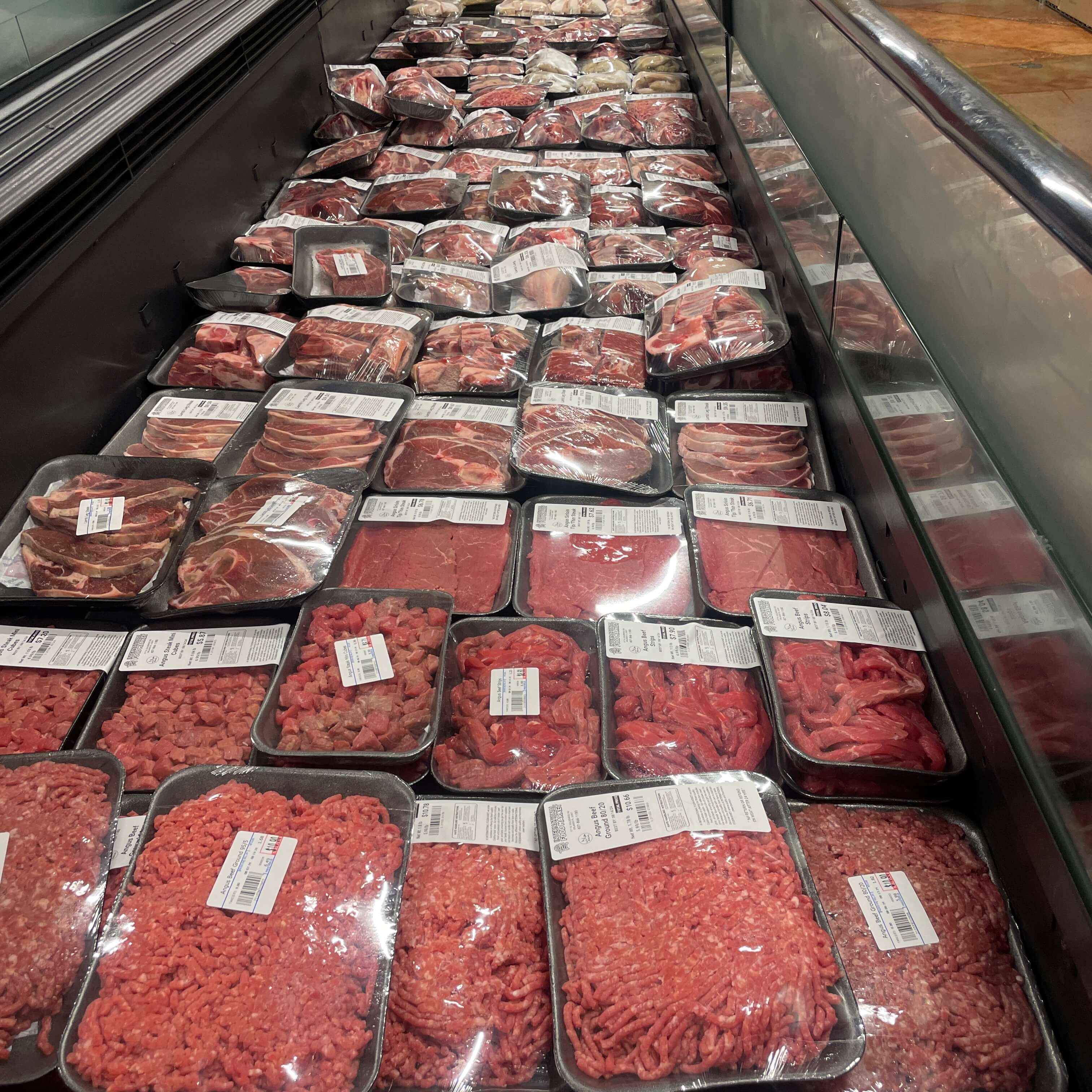 Fresh ground beef and minced meat at International Food Market Orlando's halal meat section.