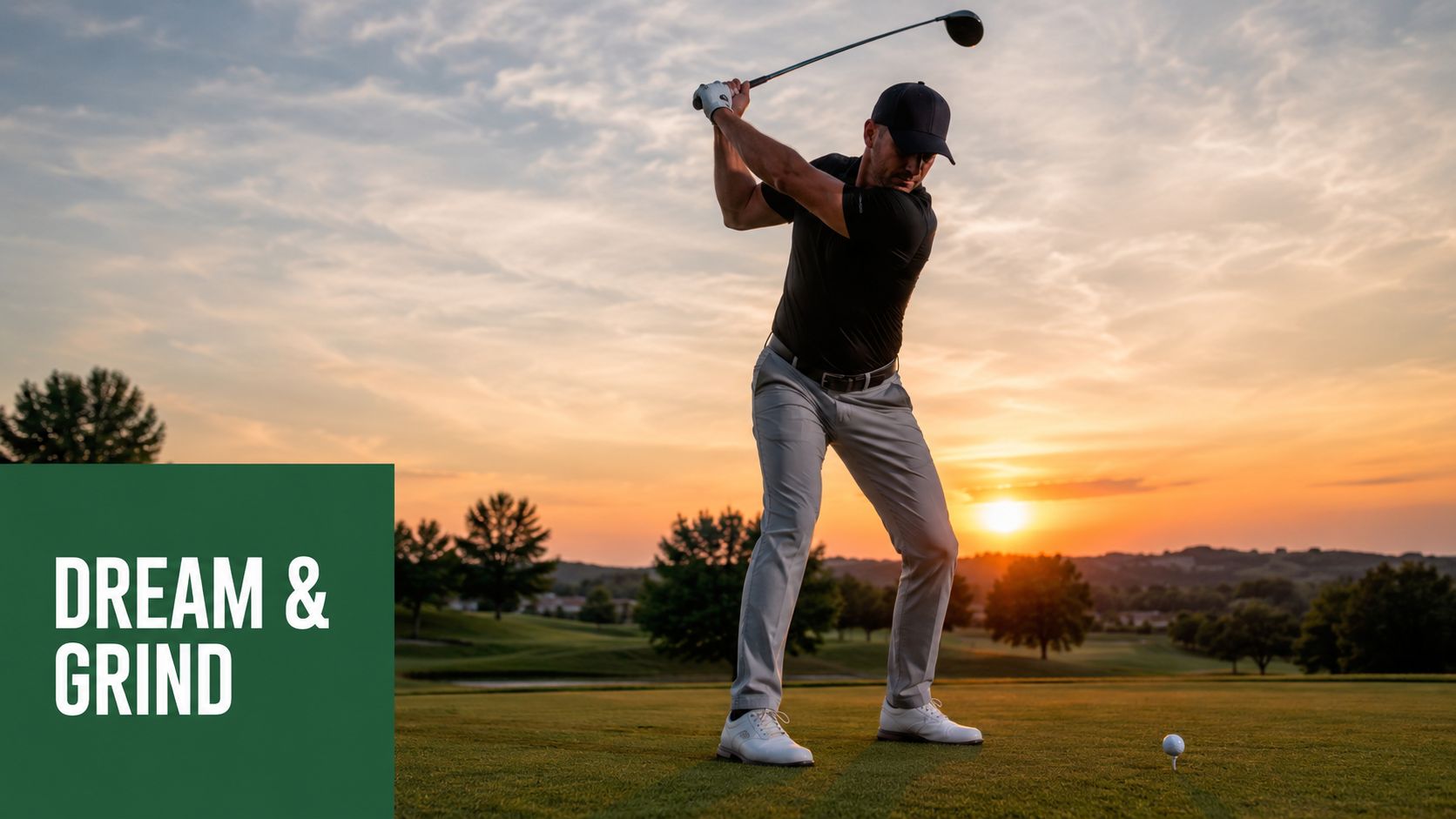 A professional golfer swinging a club during a beautiful sunset on a green golf course.