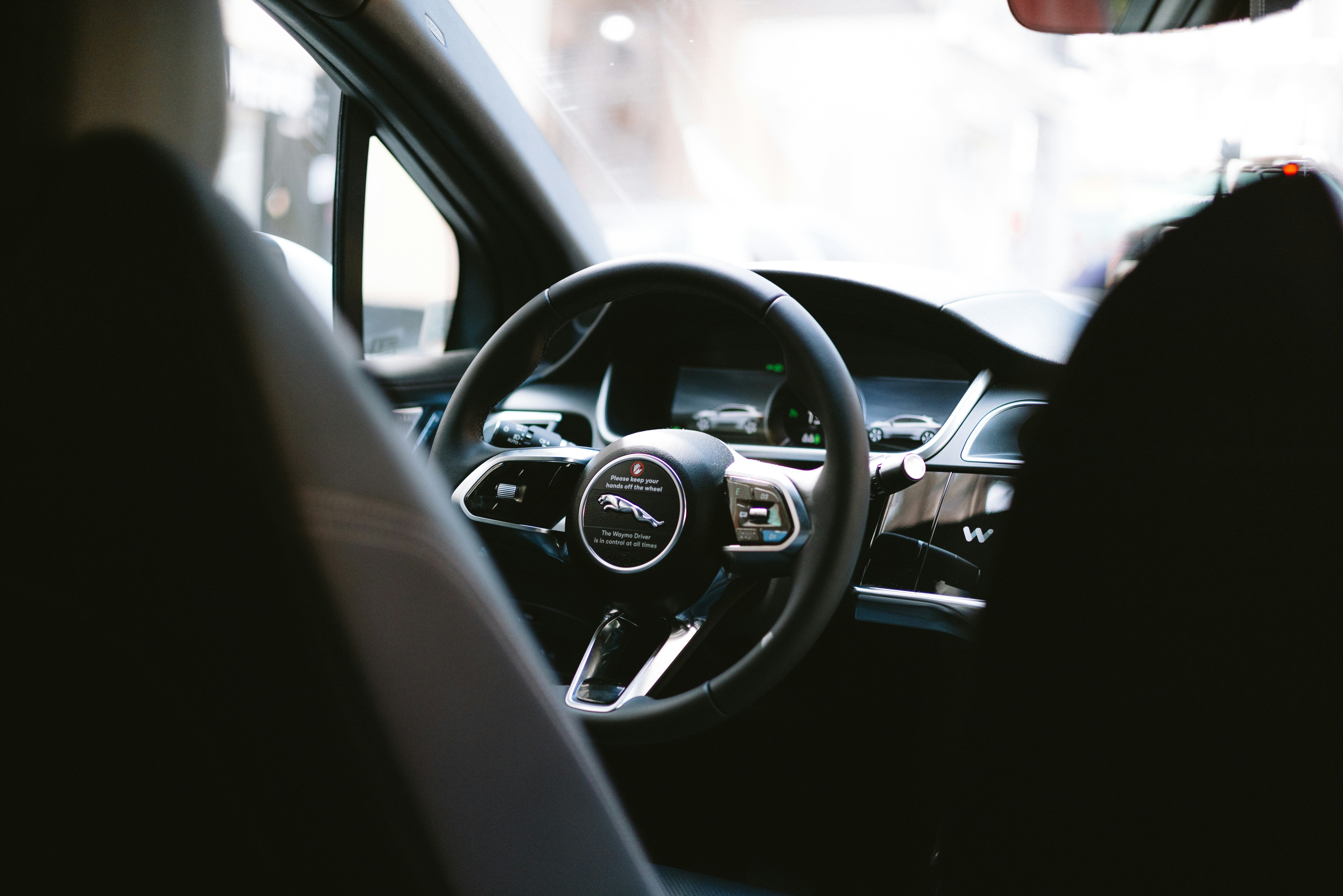 Inside view of a car's steering wheel.