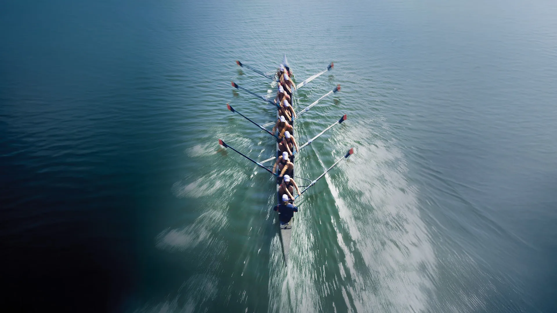 Sherpas guiding climbers up a mountain