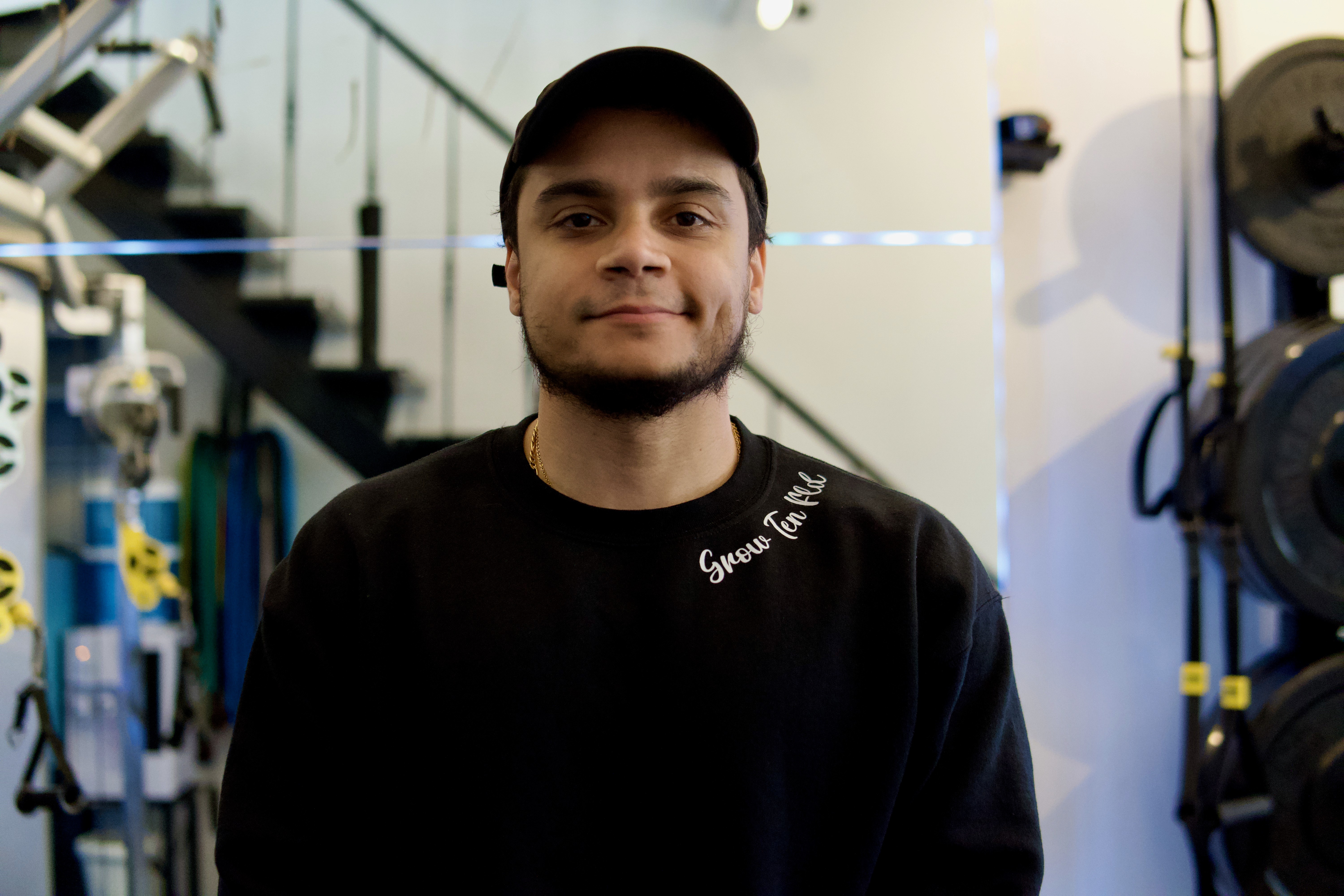 A portriat shot of the founder of Ten Fld NYC, Jonathan Olivencia