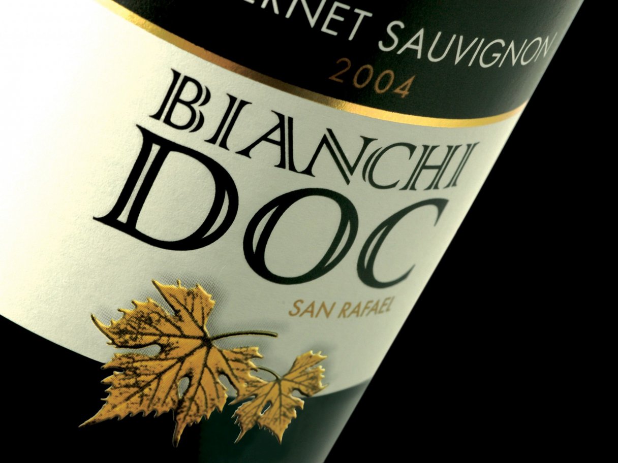 Rustic cabin in a golden field at sunset