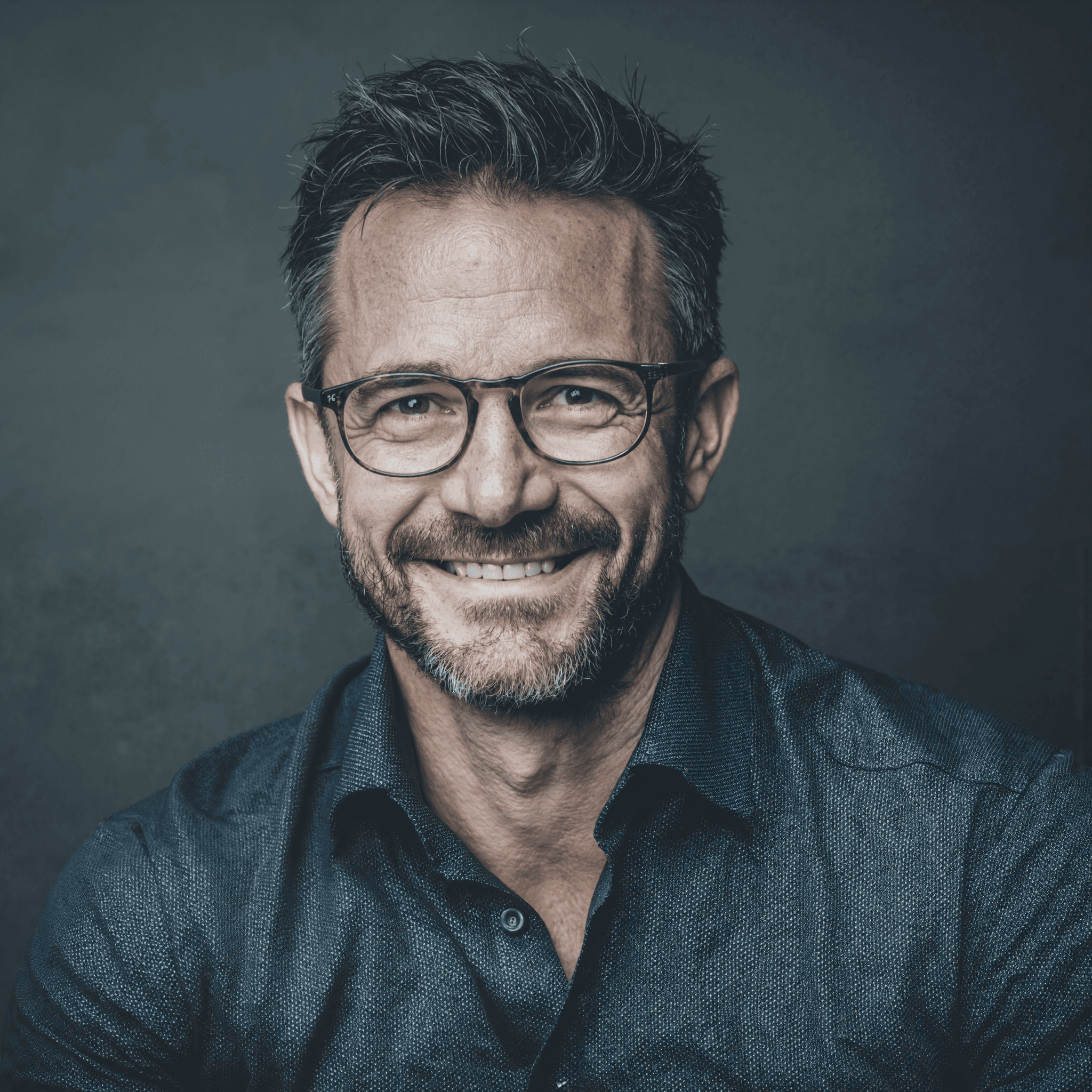 Middle-aged white man with glasses representing an investor for AI Indy