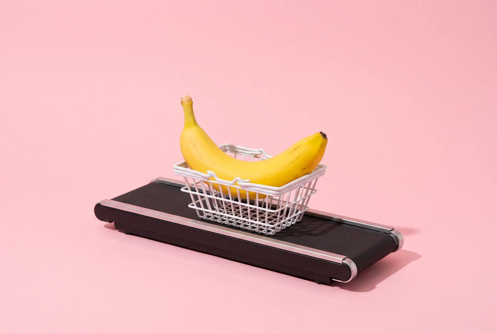 A banana in a tiny basket on a checkout conveyor belt, Relay price and free trial in QUITTR vs Relay