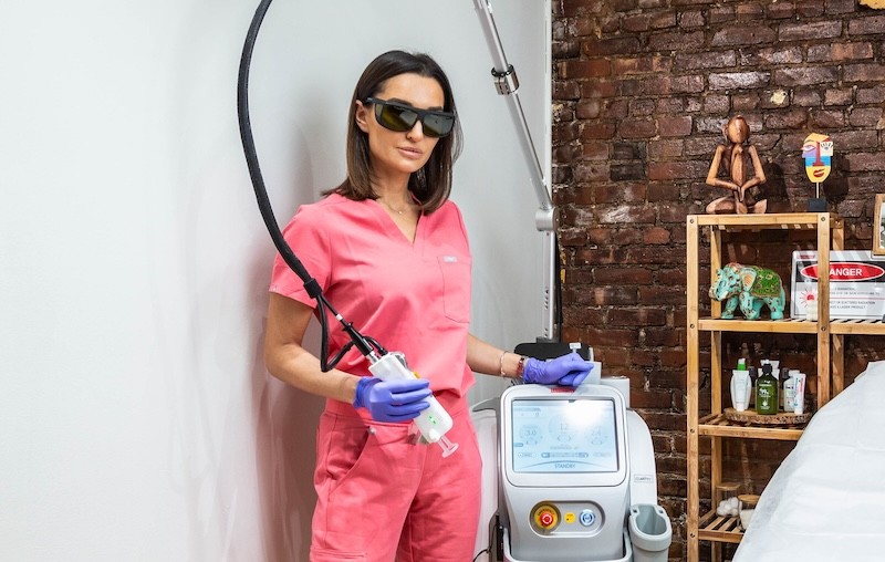 Ecous Laser Greenwich Village – esthetician preparing for advanced skin rejuvenation treatment