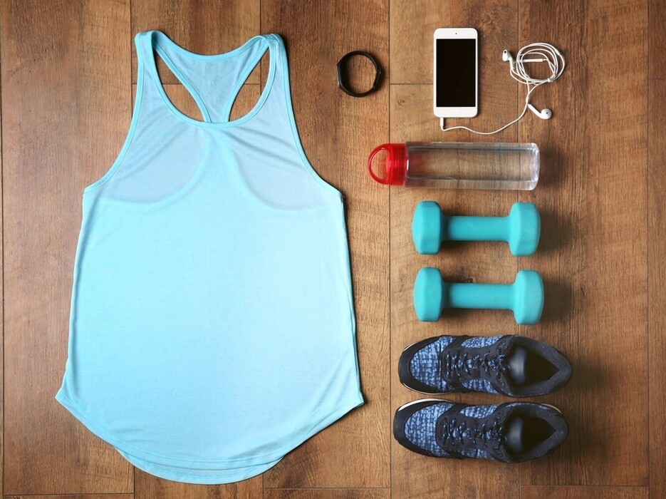 workout clothes and gear laid out at home to make walking speed to lose weight easier