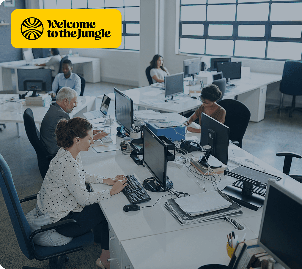People at desks in an office