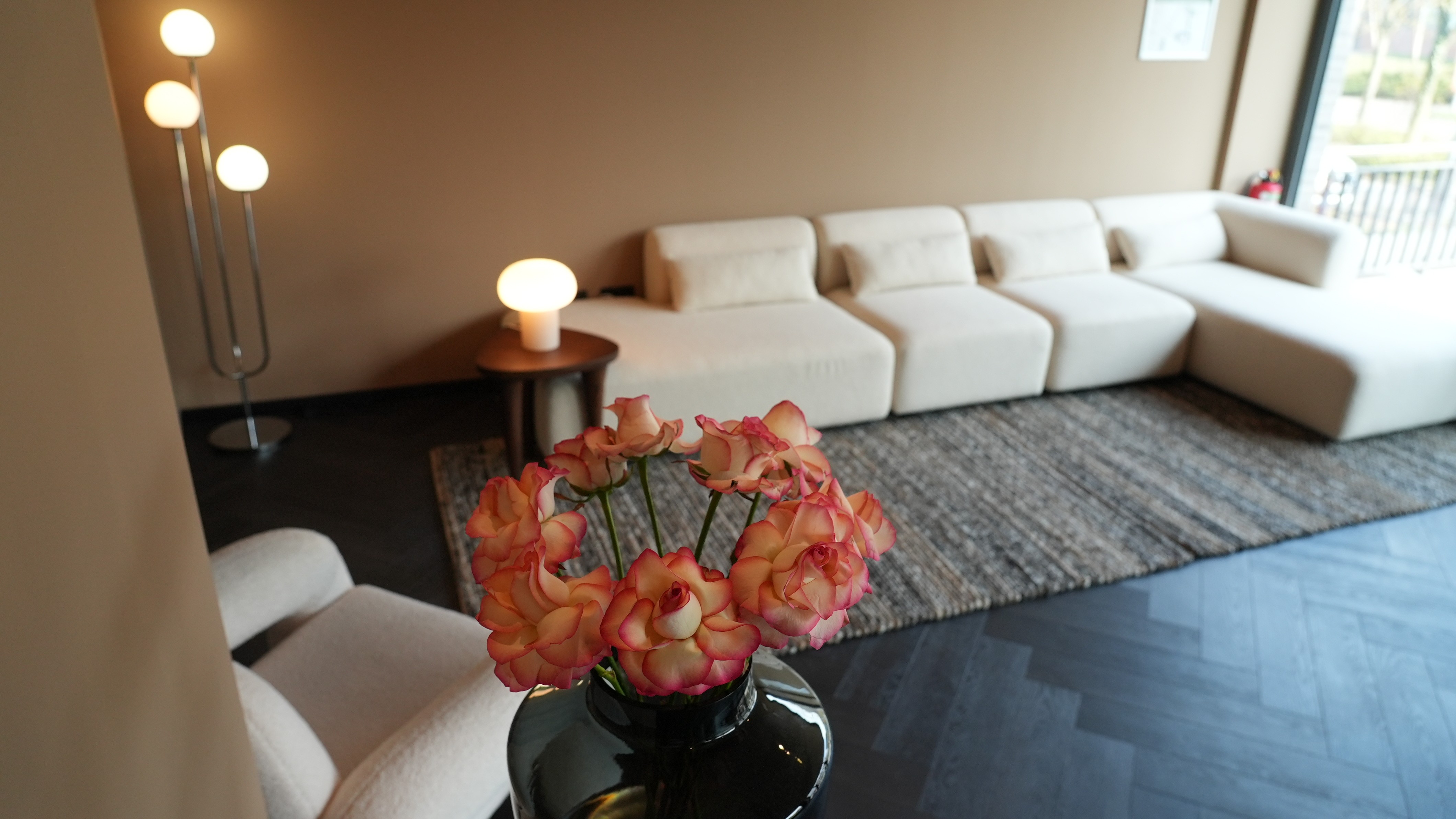 Modern white kitchen with island and bar stools