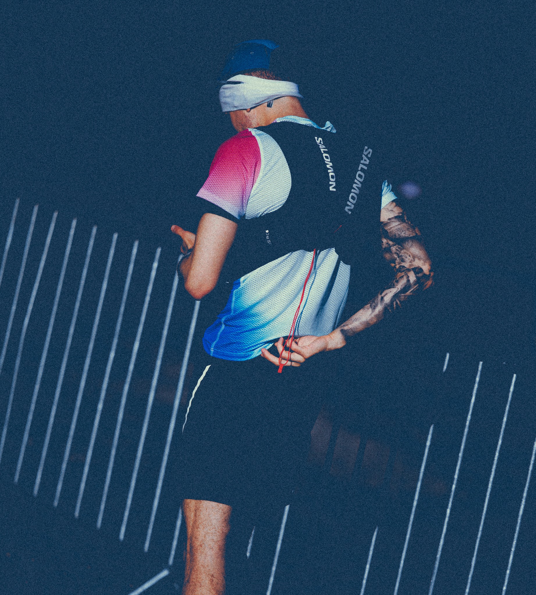 a photo of a man preparing for a race.