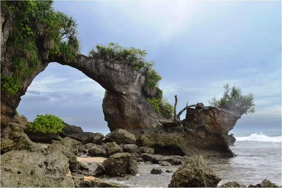Natural rock arch coastline