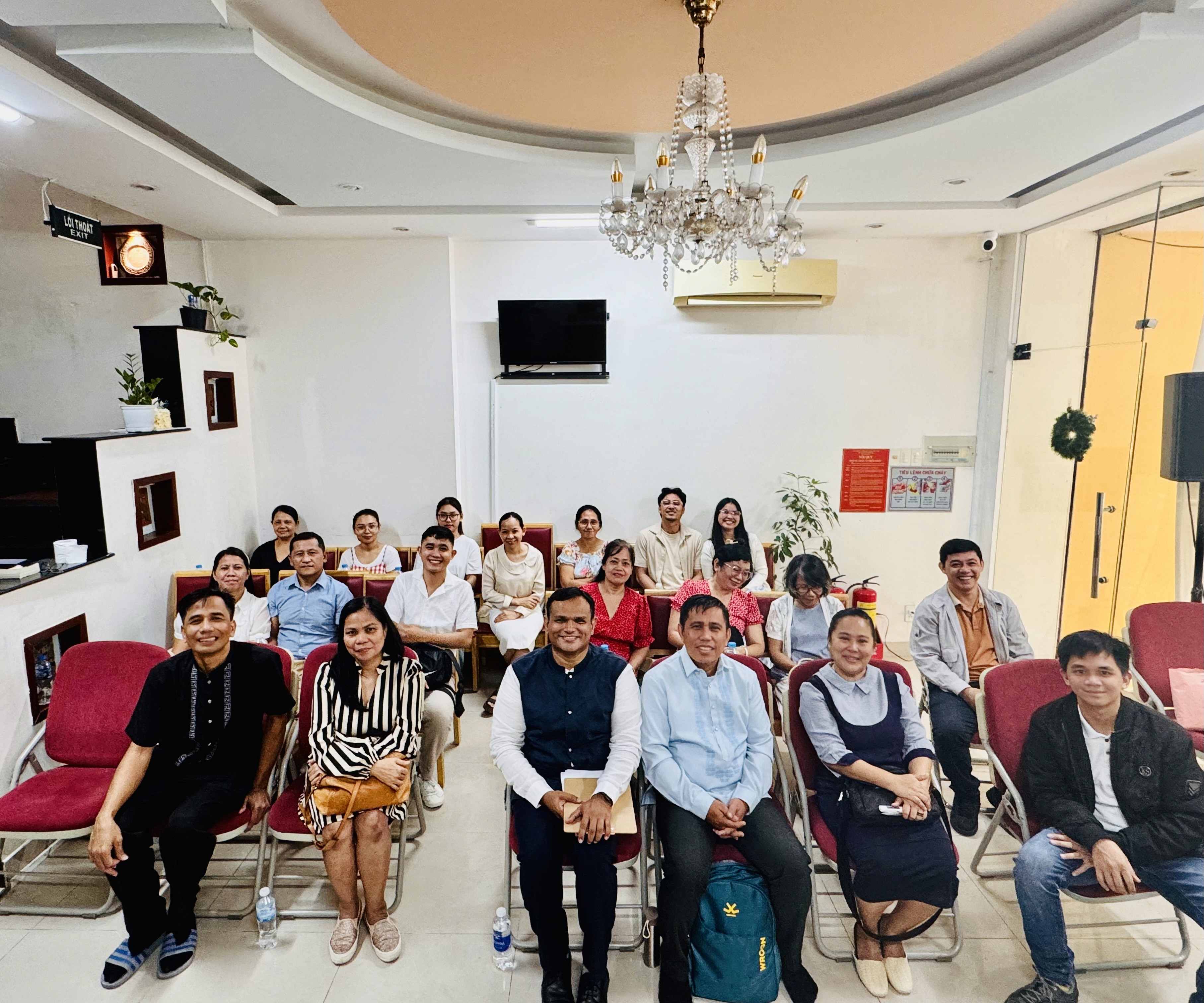 the interior of a church with pews and a gold alter