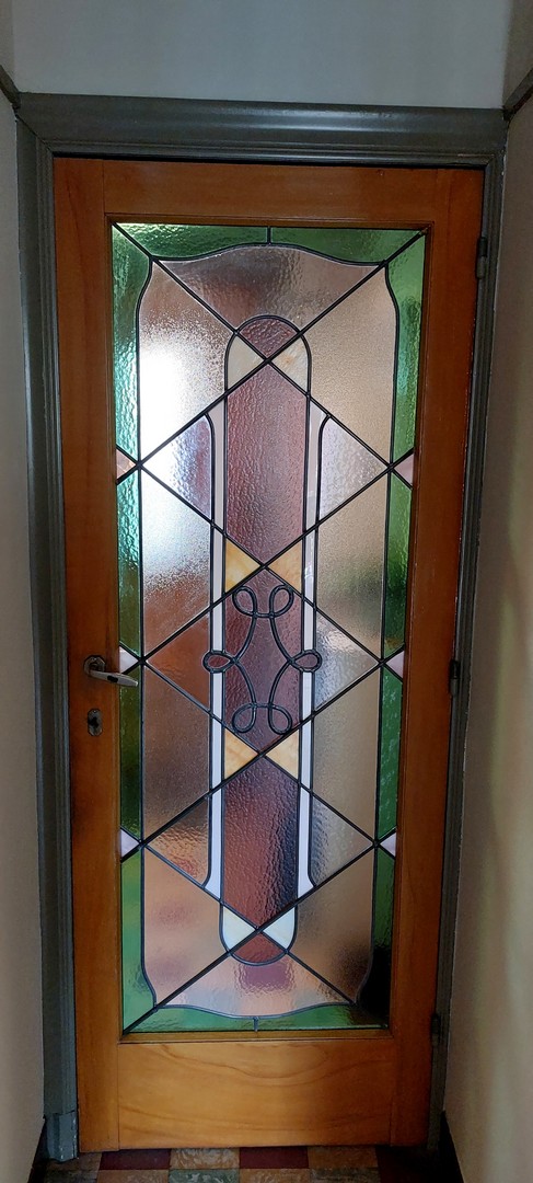 Glas-in-lood deur Deurne restauratie
