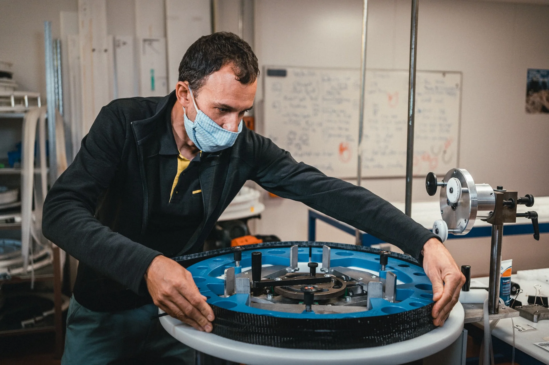 Technician analyzing a bike wheel