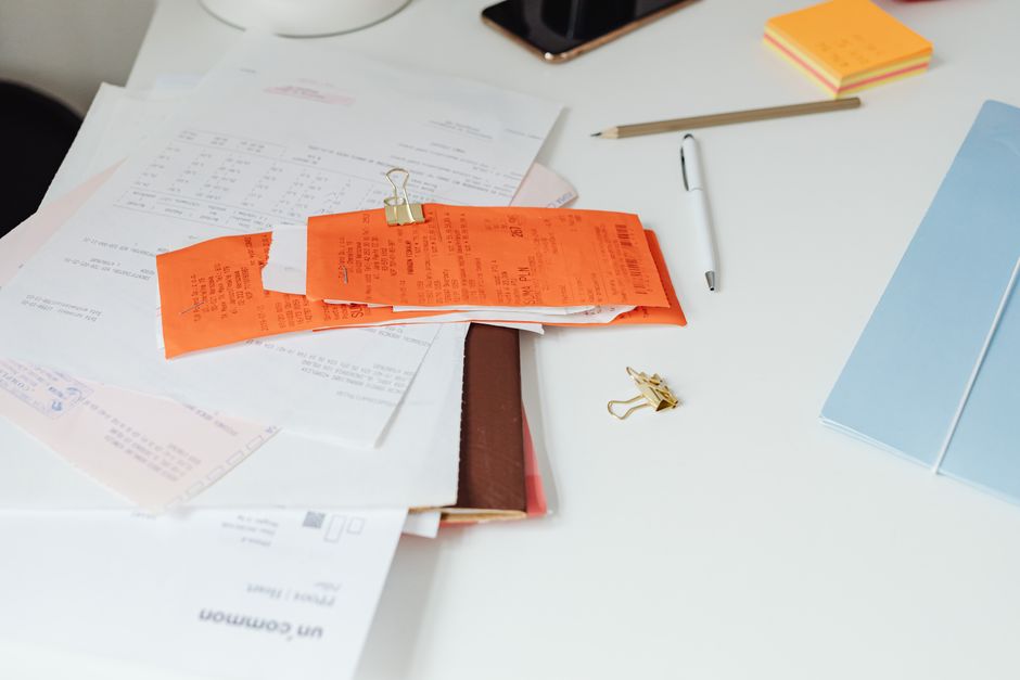 organized legal folders and financial documents for debt lawsuit prep