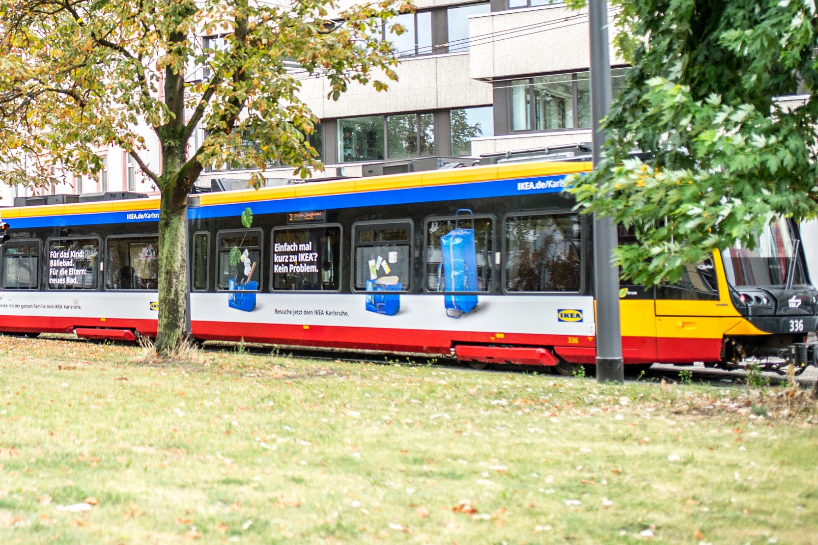 IKEA Karlsruhe tram wrapped with net huddle campaign visuals across the city.